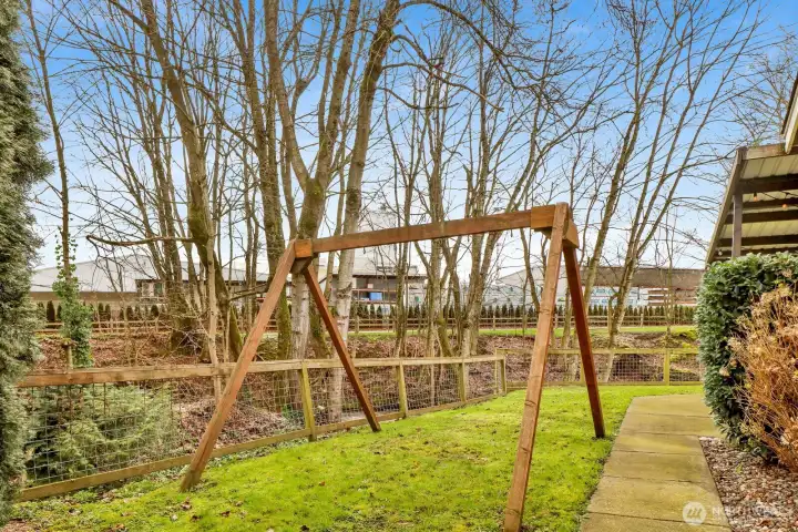 Watch this backyard come alive—lush leaves and greenery make it a true private retreat once spring arrives and it won’t be much longer!