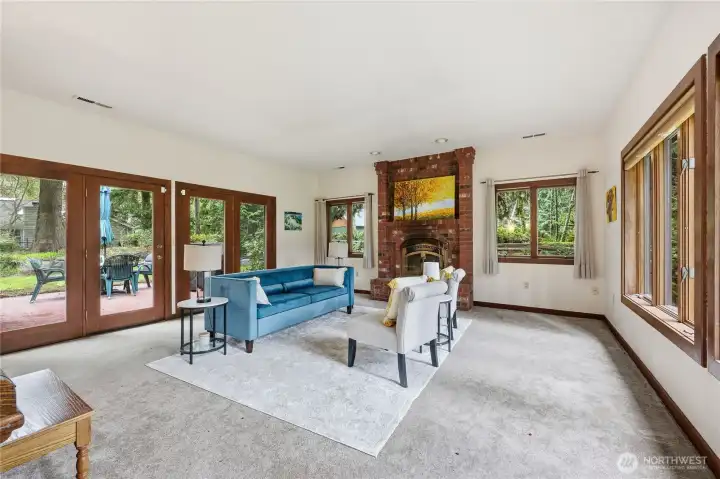 Formal living room with wood fireplace