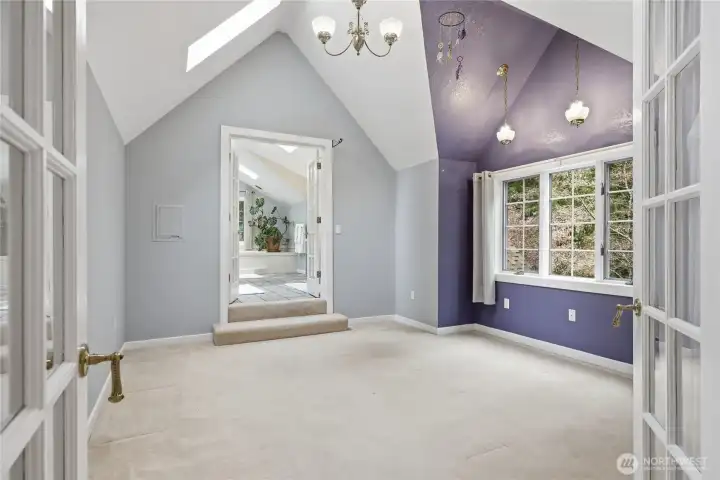 This sitting room could be used as a bedroom - a king bed can be tucked into the alcove nicely with extra space.