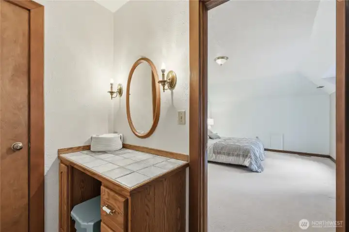 Vanity in Jack and Jill Bathroom. Bedroom #3's closet is next to the vanity