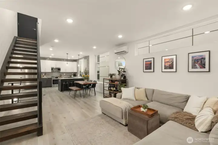 Open floor plan flooded with natural light from southern windows