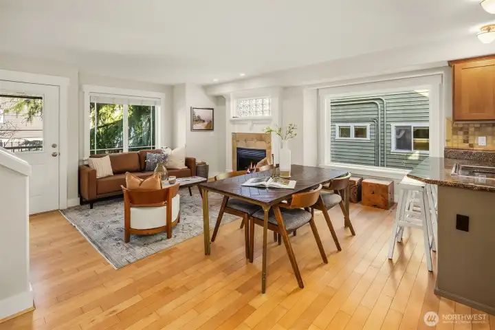 Open and inviting floor plan on main with maple hardwoods.