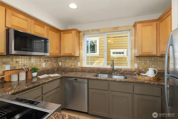 Glass top range, Bosch dishwasher and built in microwave all upgraded in the last 3 years.