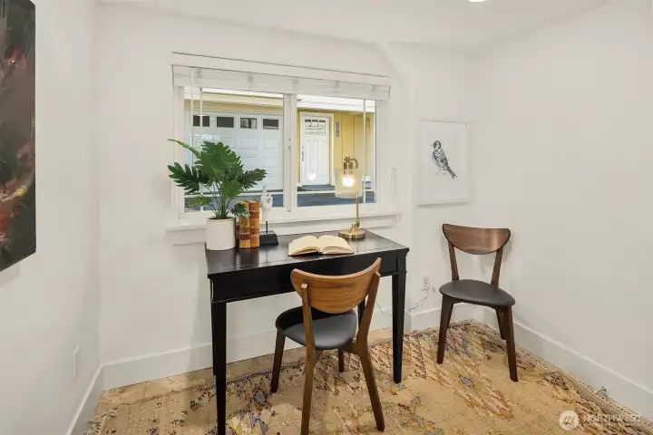 Third bedroom on lower floor with big window and deep closet.