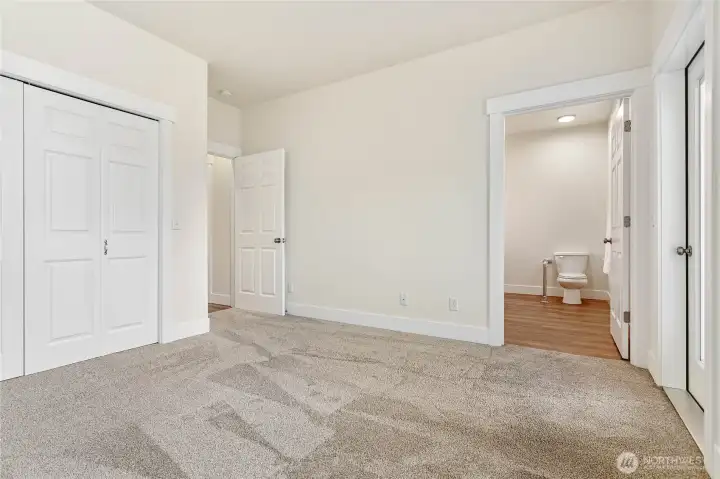 Primary bedroom features a huge walk-in closet.