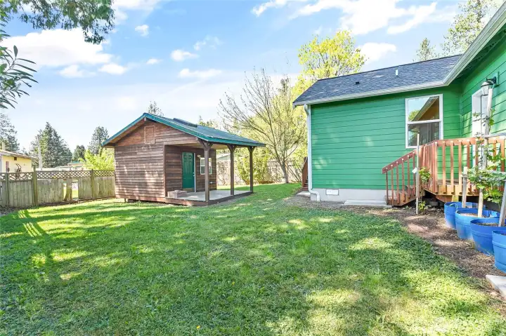 Backyard. The steps go into the garage.