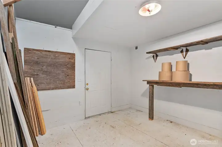 Inside shop with bench & shelves