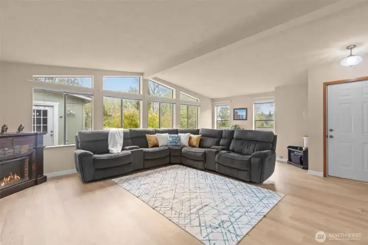 open floorplan, new LVP flooring, natural light