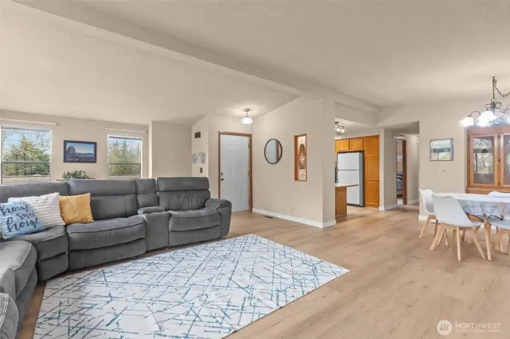 open floorplan, new LVP flooring, natural light