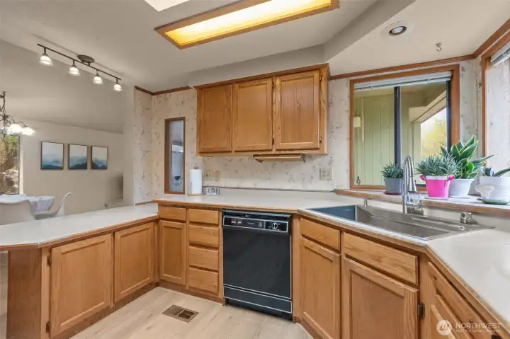 kitchen with lots of counter space, skylight