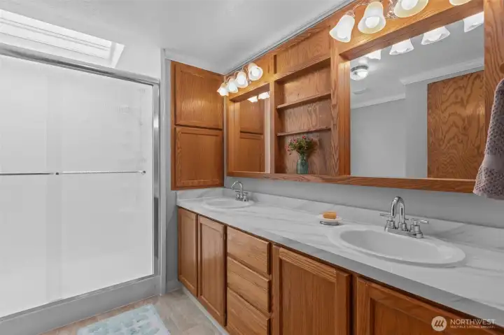 renovated master bathroom with large walk in shower
