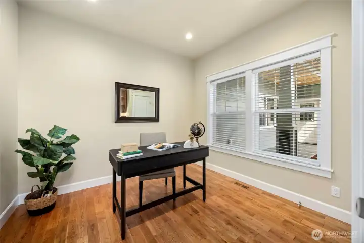 Office on primary level with built-ins & closet