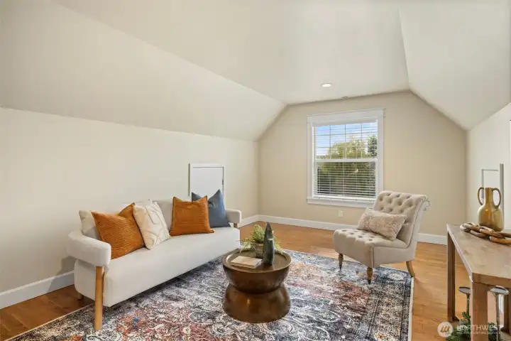 Upstairs living room, ideal for multigenerational living or for a secondary family room. Also has views of  Dyes Inlet and Olympics Mts.