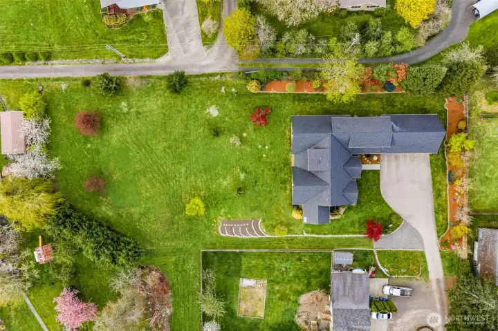Overhead of property. The yard is partially fenced, with markers in place so you can easily walk the property and get a sense of the lot’s size and space.