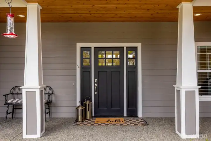 Front door with covered patio.