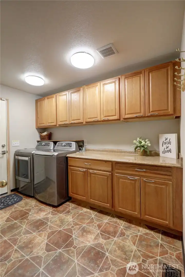 Laundry room with lots of storage.