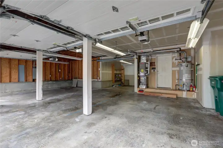 Large Garage with one bay extra deep 32' you can possibly fit 4 cars.