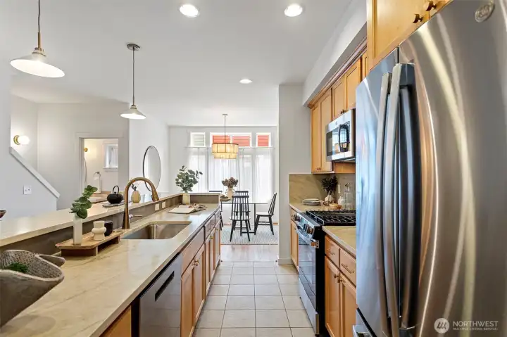 Kitchen is nicely connected to a spacious dining room for easy entertaining.