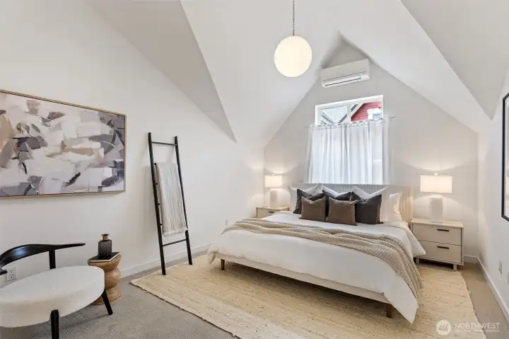 The entire interior was just painted in a designer warm white tone.  The dramatic globe light fixture was just added. New carpeting was also added throughout.