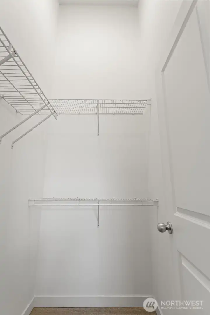 The 2nd primary bedroom also features a large walk-in closet with faulted ceilings.