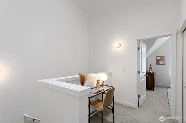 There is a thoughtful area on the upstairs landing that would make for a perfect home office.