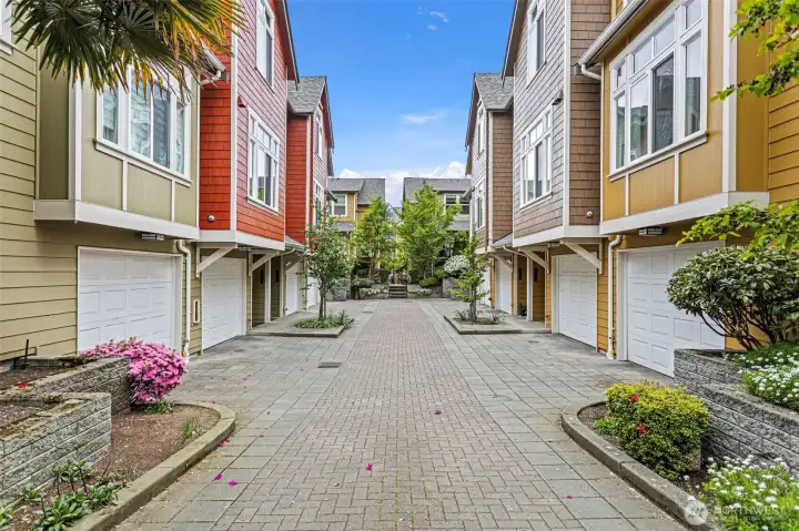 Ravenna Court driveway with beautiful landscaping.  Unit C is the 3rd home on the right.