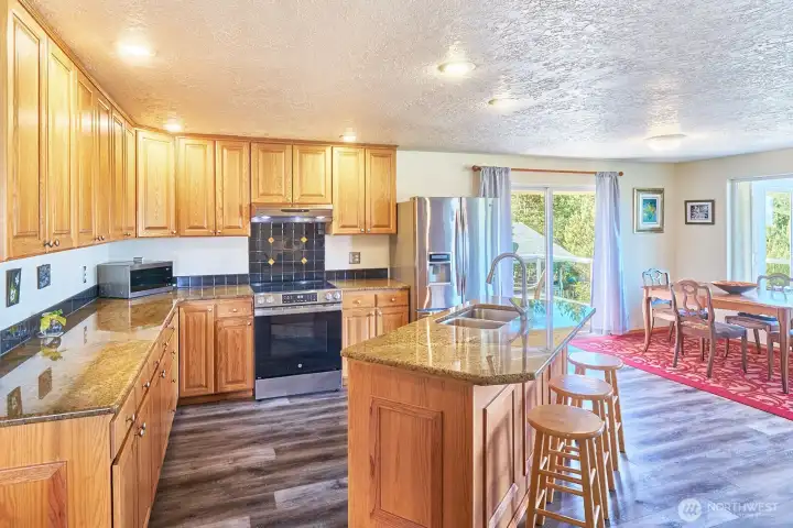 Open plan kitchen with eating counter