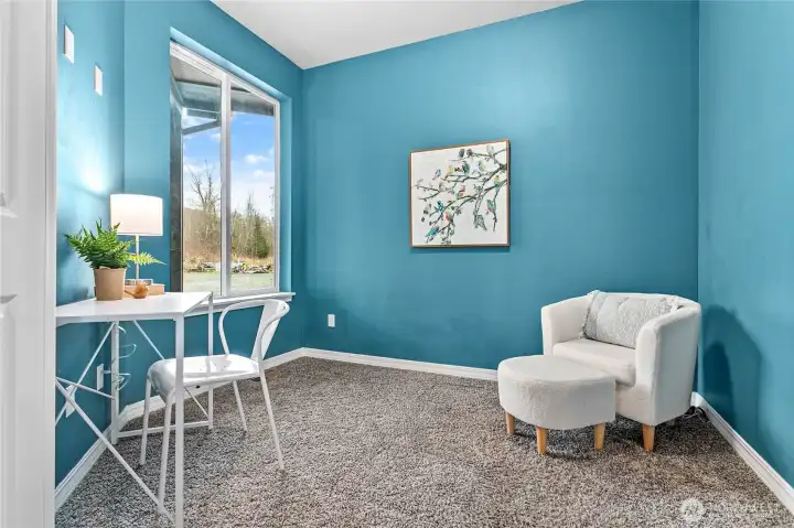 Perfectly sized office or den adjacent to the front entry area and looks out to the front yard.