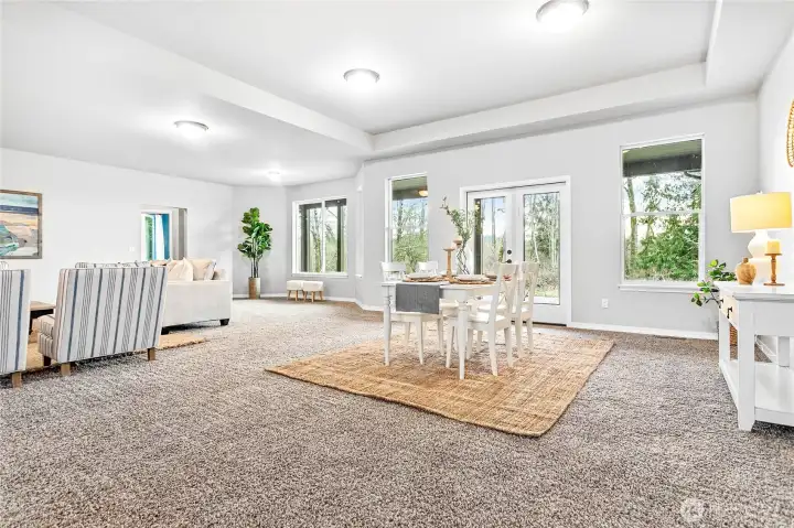 Easy access to the large covered back deck from the dining room, making it convenient for indoor/outdoor living, grilling and entertaining.
