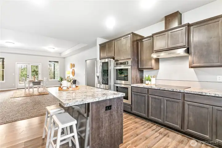 Another view of the kitchen and dining room.