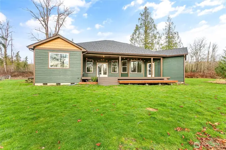 Another view of the back yard and deck - so much space to create your own outdoor oasis!
