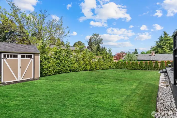 Bordered by healthy trees that create a natural privacy screen.