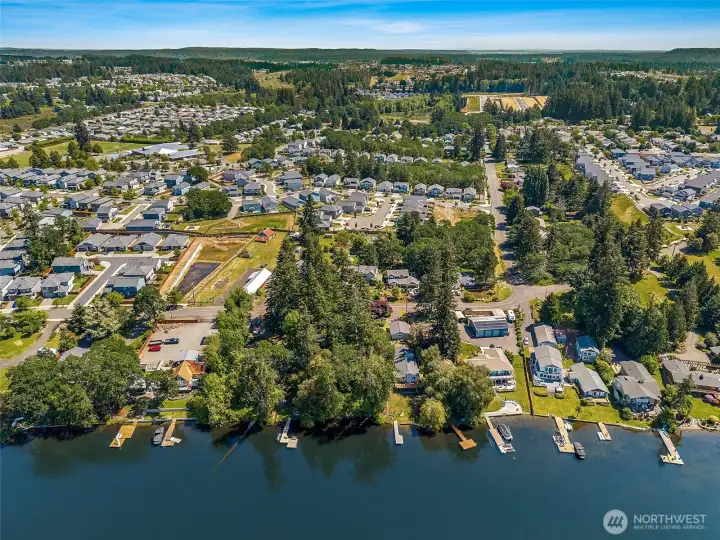 There is a lot of development around, but this sits on a quiet street on your own 1/2+ acre property.