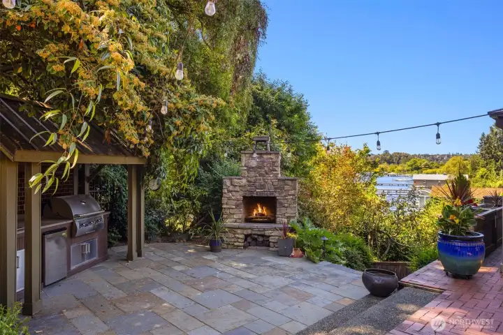 large out door entertaining area with buit in bbq, fireplace and covered sitting area large out door entertaining area with buit in bbq, fireplace and covered sitting area