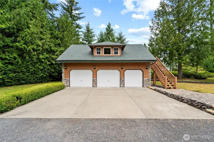 Let's head just out the backdoor and up the stairs to a glorious, finished room above the garage.