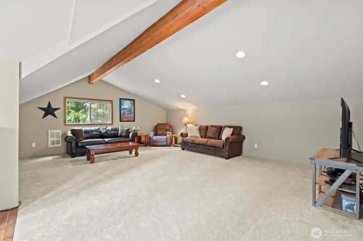 New carpet, tile, cabinetry and recessed lighting.
