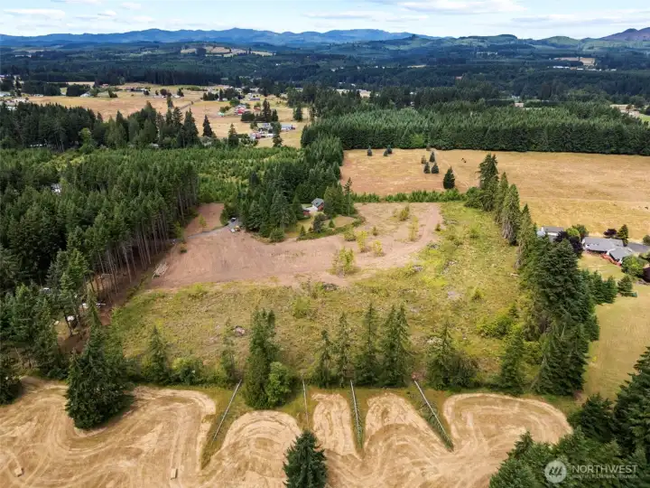 Aerial view of 9.43± acres. Wooded acreage replanted with approximately 2,400 seedlings to maintain designated forest land tax status.