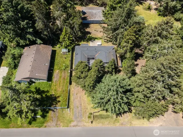 Overhead view of the front of the home and driveway.