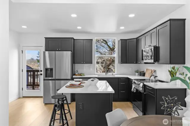 kitchen with door to deck for easy outdoor dining