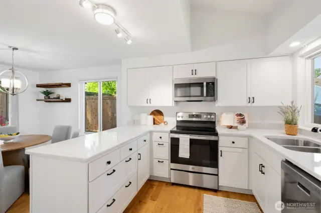 Newer appliances range, microwave and dishwasher.  (Refrigerator is not new.)