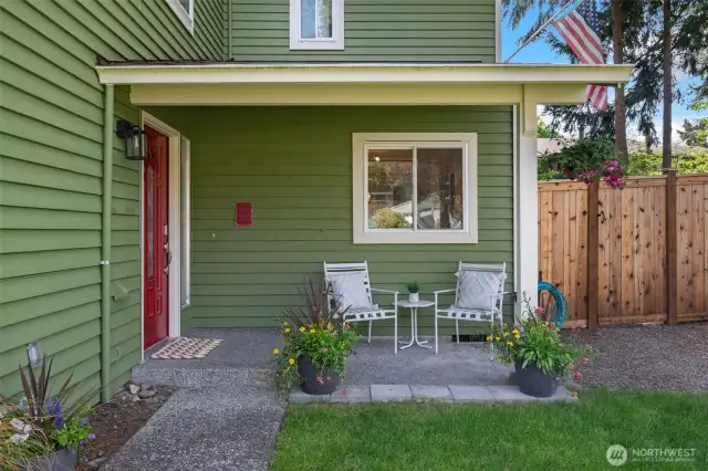 Front porch entry is so inviting, and practical due to cover