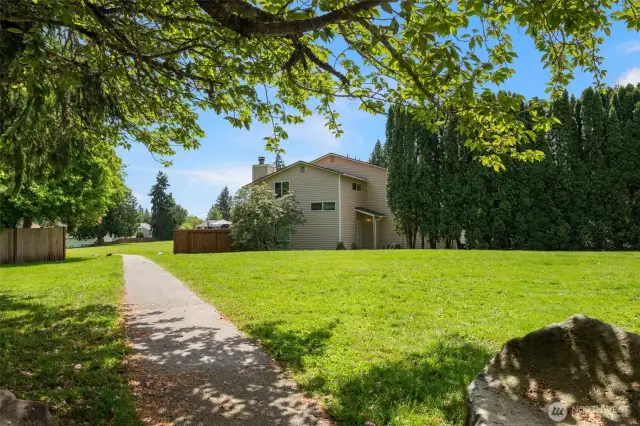 Big centrally located park with picnic tables for the community.