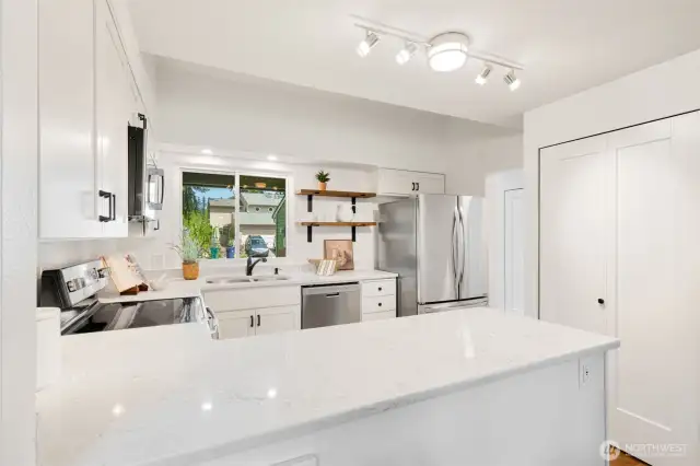Kitchen with updated cabinets, counter tops, and more.