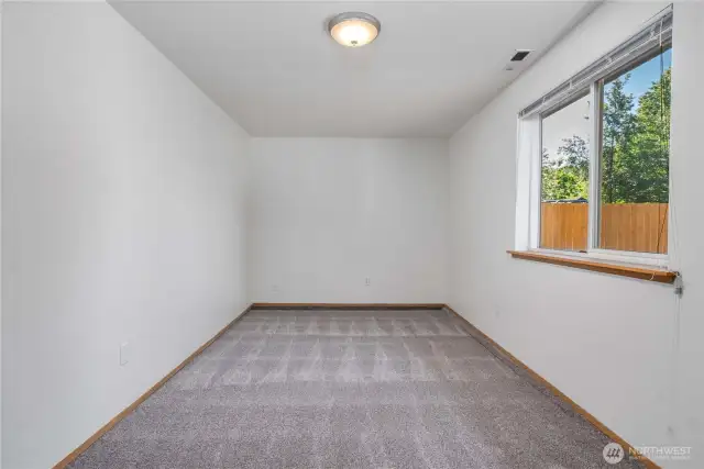 Bonus room downstairs with new carpet
