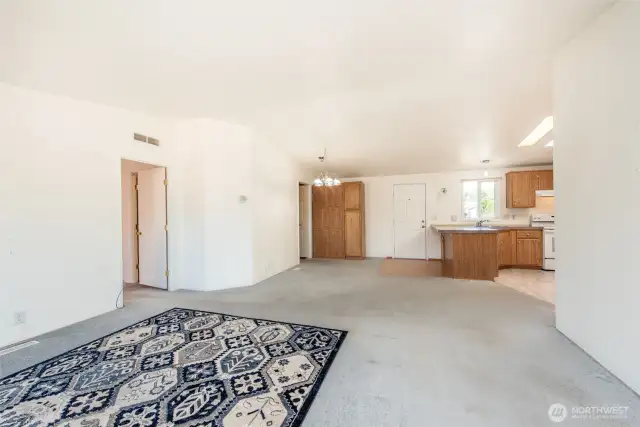 Large living room with access to outdoors