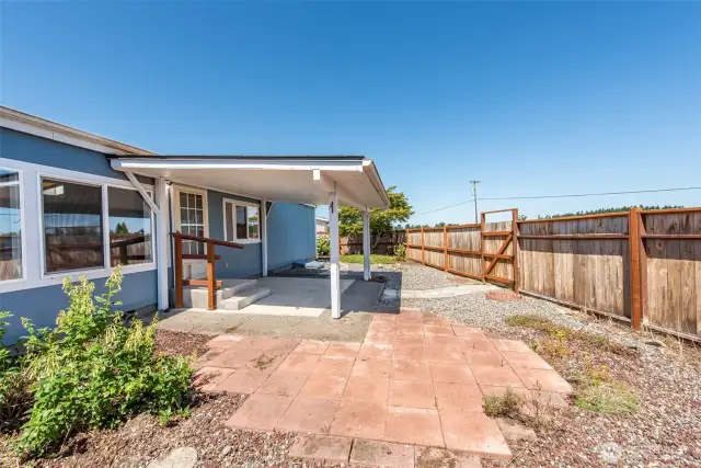 fully fenced and gated backyard