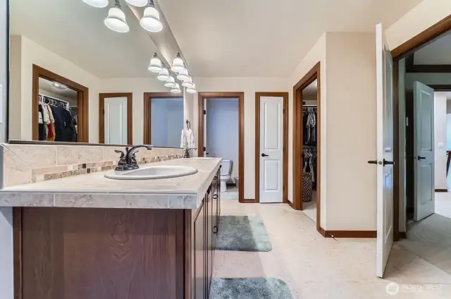large bathroom with separated bathtub and shower
