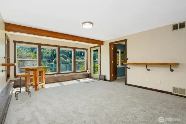 Rec room with a separate entrance and views of the lake