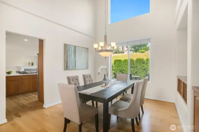 Dining room accented by expansive windows
