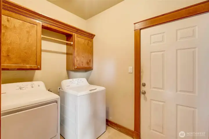 Spacious laundry room that leads to the oversized 2 car garage.